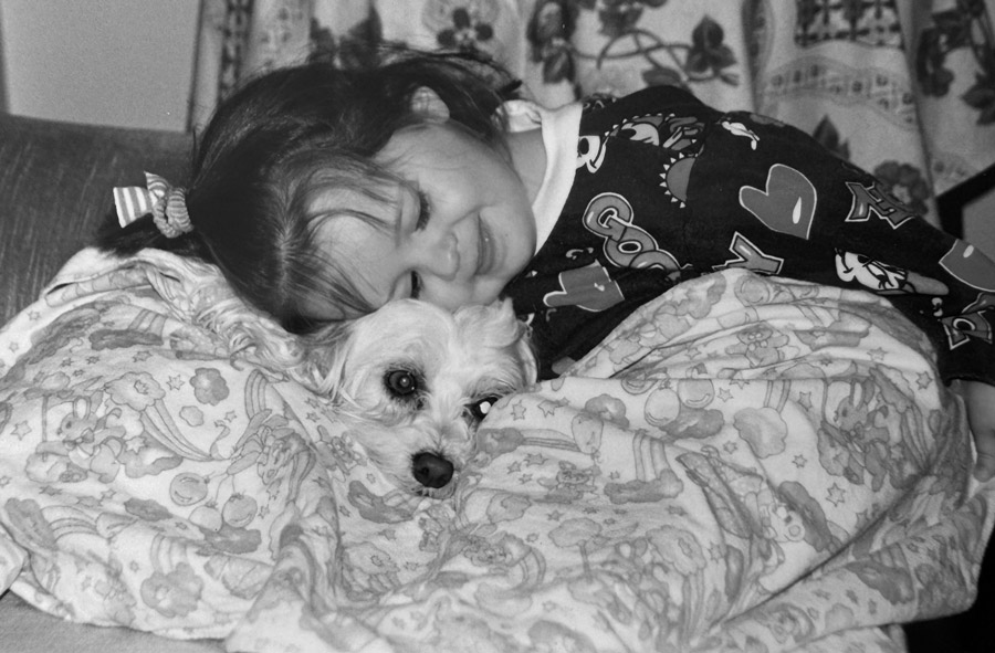 girl and her maltese dog